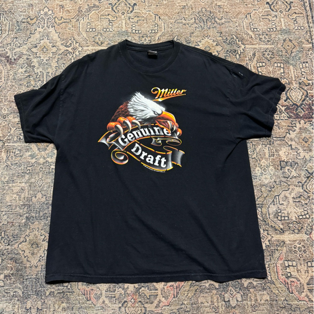 Miller tee used in good condition . Fits XL/L worn a handful
